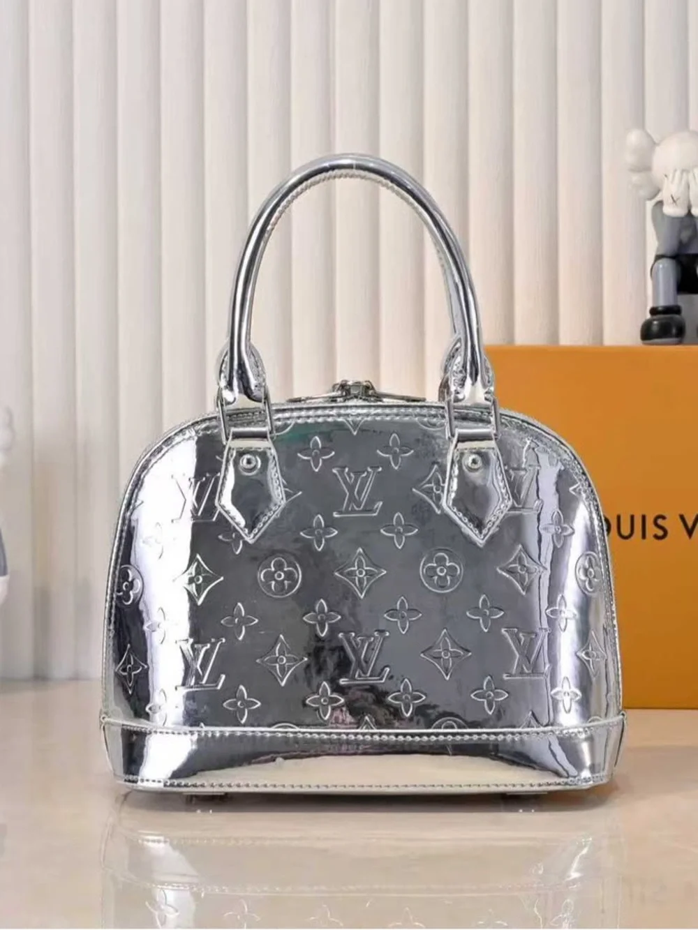 Louis Vuitton Silver Monogram Alma Satchel
